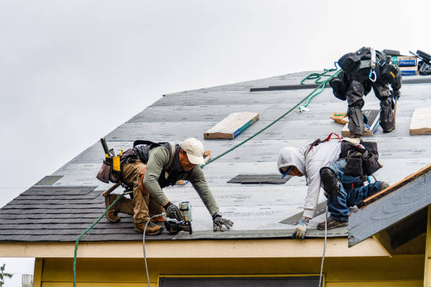 Professional Roofing technician working in Whittier, NC